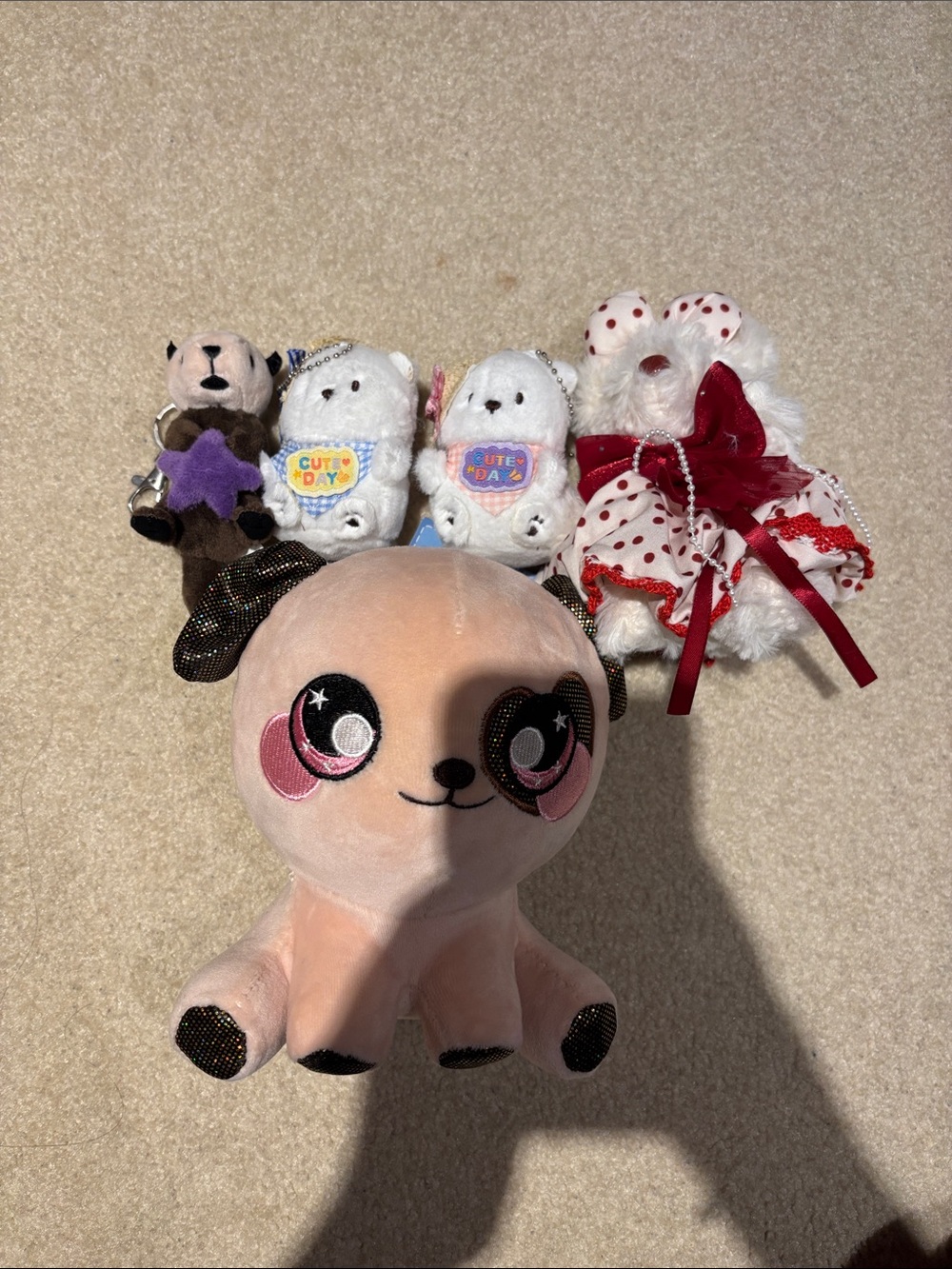 4 keychains + dog plush